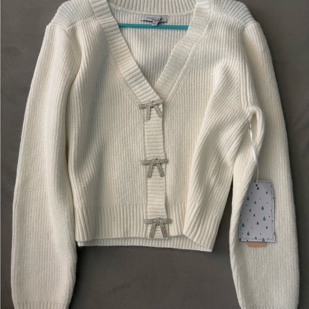 White Ribbed Sweater with Rhinestone Bow Accents
